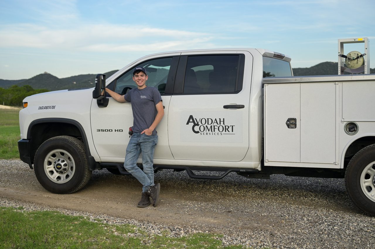 Avodah Comfort Services branded service truck in the Texas Hill Country